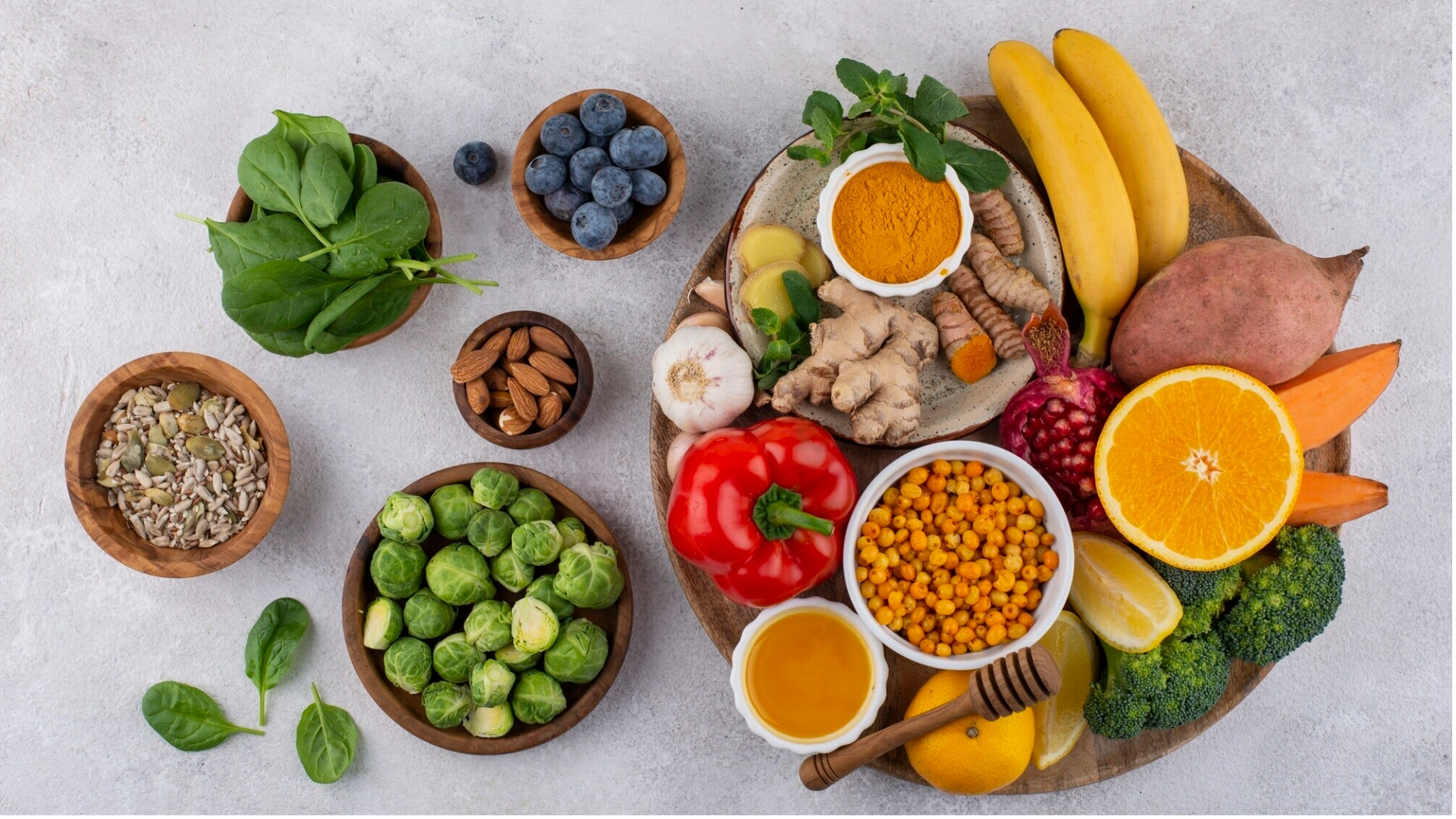 Selection of nutrient-dense foods including berries leafy greens seeds and other foods commonly described as superfoods
